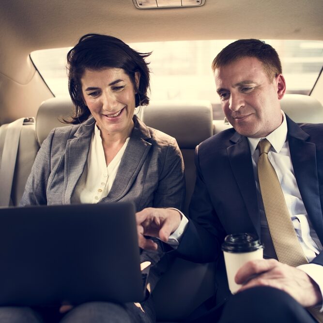 Business People Meeting in car